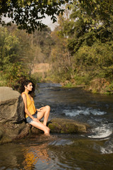 Fototapeta premium Natural Lifestyle Fashion Model in Handmade Top in Nature