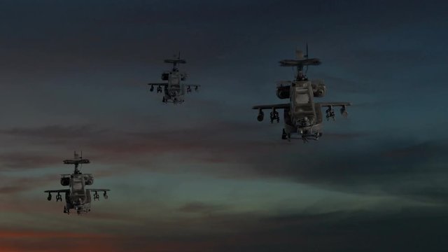 Three apache gunships flying against dramatic sky