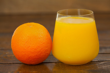 Delicious fresh squeezed Orange juice in  transparent glass