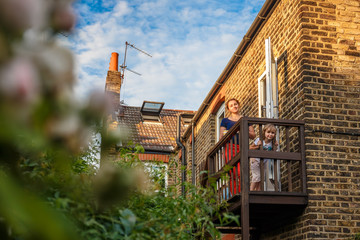 Family in terraced house, London suburb