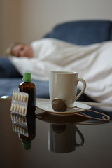 Horizontal view of medicines for ill woman