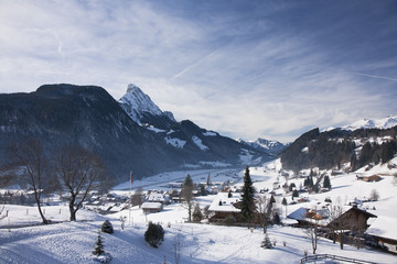 Fototapeta na wymiar Landscape of Gstaad in Switzerland, with snow in winter