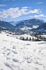 Fototapeta na wymiar Landscape of Gstaad in Switzerland, with snow in winter