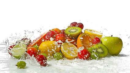 Fototapeta na wymiar Fresh fruits and berries with splashing water on white background