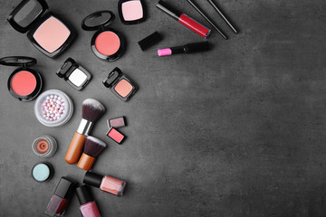 Decorative cosmetic set on color background