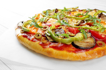 Tasty homemade pizza on table