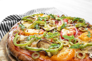 Tasty homemade pizza on table