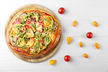 Tasty homemade pizza on table