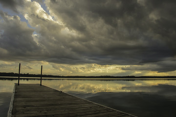 dock, lake, angry clouds, quiet lake view, Minnesota
