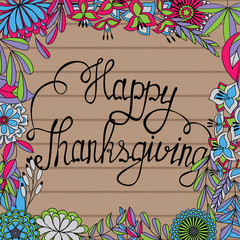 Happy Thanksgiving card on wooden background