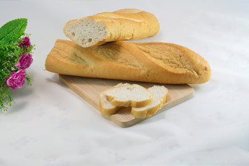Fresh bread with slice
