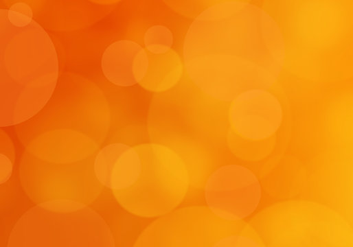 Abstract sunny bokeh on orange background