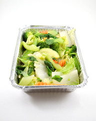 Vegetables in metal takeout tray