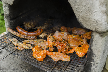 Meat on a spit at a barbecue.