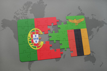 puzzle with the national flag of portugal and zambia on a world map background.