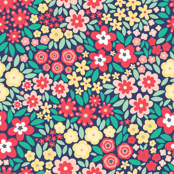 Vector seamless pattern with flat flowers and leaves. Cute floral background for your design. Yellow, red, light pink and green elements on dark blue backdrop.