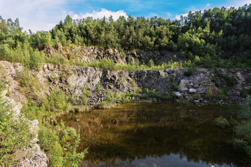 Fototapeta na wymiar abandoned flooded quarry, Czech republic