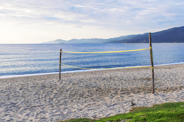 Beach volley court with sea background