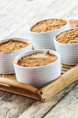 Creamy rice pudding sprinkled with cinnamon