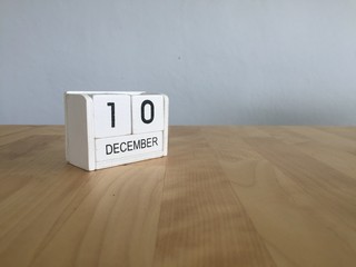 December 10th.December 10 white wooden calendar on vintage wood