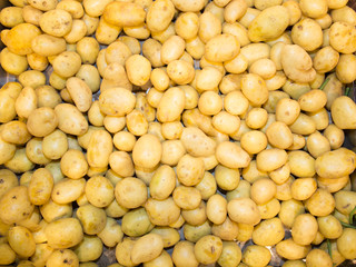 Close-up of a fresh raw potatoes background