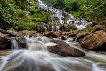 Fototapeta na wymiar Mae Ya waterfall is a beautiful waterfall in Chiang Mai, Thailand.