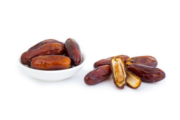 Sweet and healthy dates isolated on white background.
