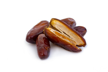 Sweet and healthy dates isolated on white background.