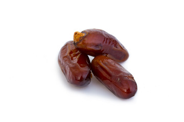 Sweet and healthy dates isolated on white background.