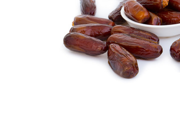 Sweet and healthy dates isolated on white background.