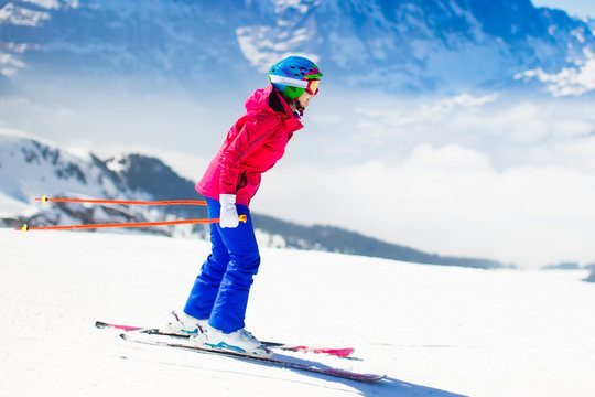Young woman skiing in the mountains.