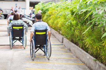 Obraz premium People with disabilities can access anywhere in public place with wheelchair,that make them independent in transportation and feel they are not the stranger from social.