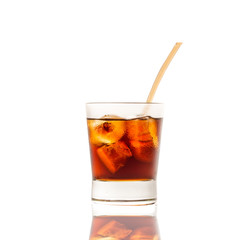 Fototapeta na wymiar Cola pouring in a glass