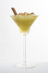 martini cocktail with cinnamon on white background