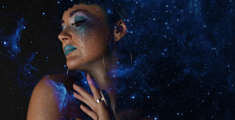 Portrait of Beautiful Woman with Glitter Makeup. 