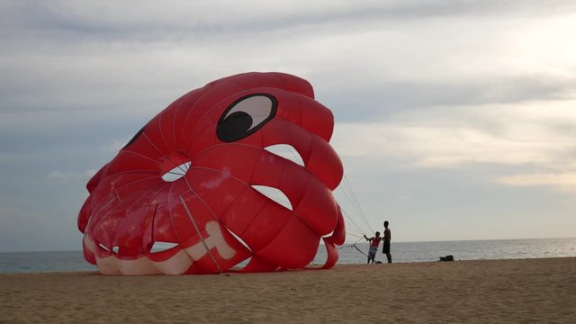 4K parasail on the beach with sunset background , Phuket , Thailand