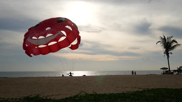 4K parasail on the beach with sunset background , Phuket , Thailand