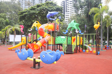Stock Photo:.Colourful playground for children in public park Su