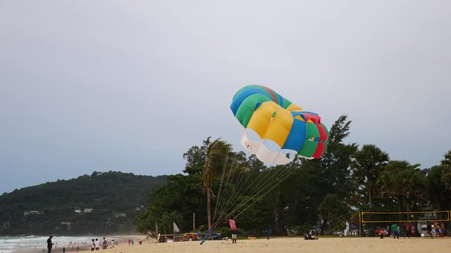 4K parasail on the beach with sunset background , Phuket , Thailand