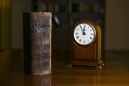 Bible and clock