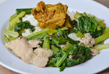 stir fried Chinese cabbage and pork bone curry on rice