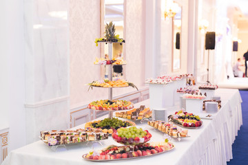 Different kinds of baked sweets on a buffet