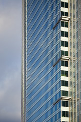Fototapeta premium Golden office buildings against the sky