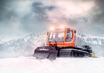 Tractor cleaning snow outdoors