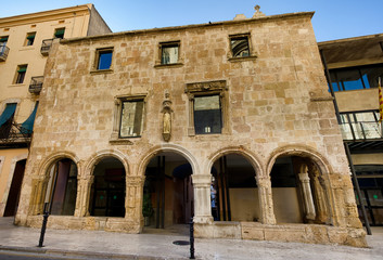 Fototapeta na wymiar Facade of the roman building preserved till our time in Tarragona, Spain