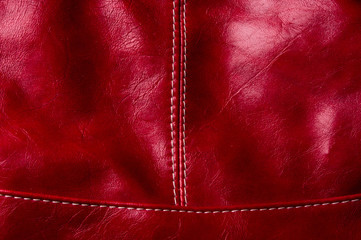 seams on leather hand bag