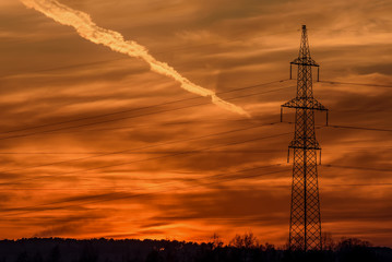 sunset sky clouds orange electric power lines tower