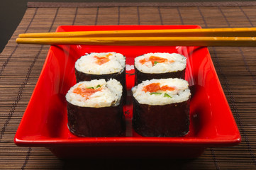 still life - set the rolls on a red plate