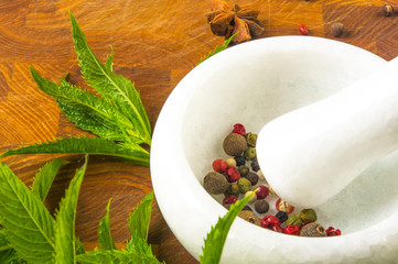 Fresh spearmint herb in the mortar