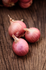 red onions on a wooden background,Raw material for cooking